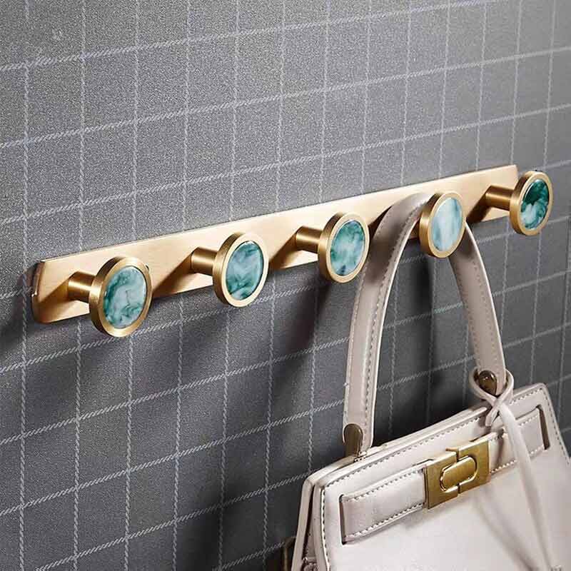 Barre porte manteau dorée
