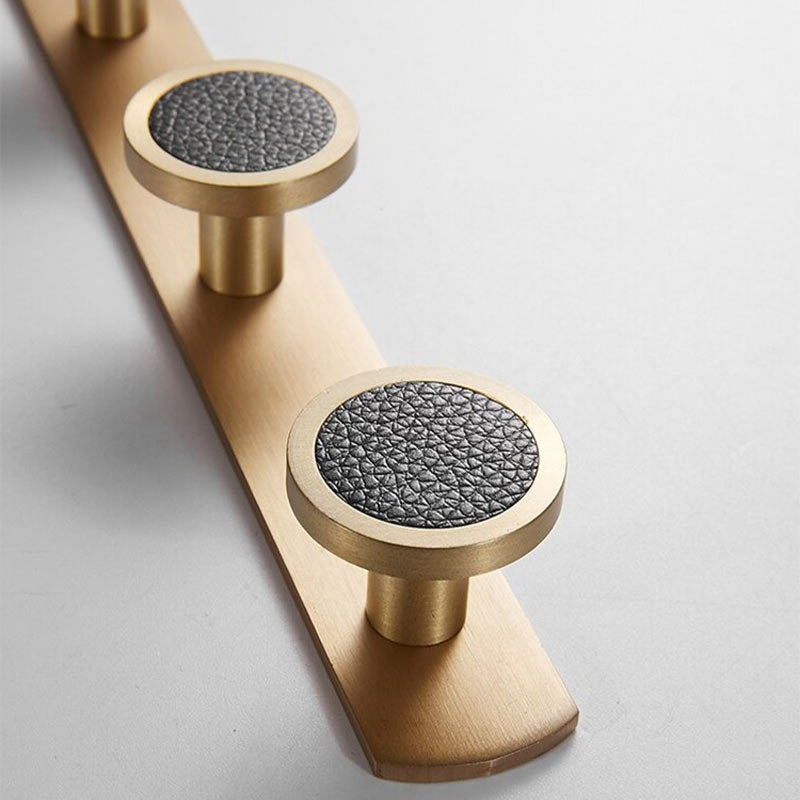 Barre porte manteau dorée